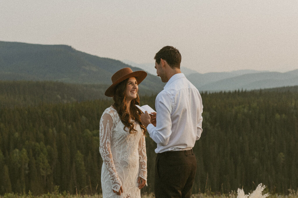 bride and groom exchanging vows as they elope in british columbia