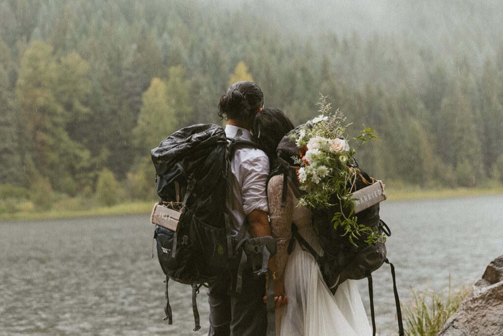 close up of bride and groom holding hands and gazing in the distance