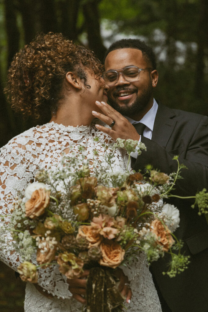 bride and groom during their fall elopement in a forest in british columbia