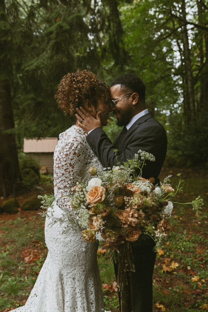 boho bride and groom in the forest