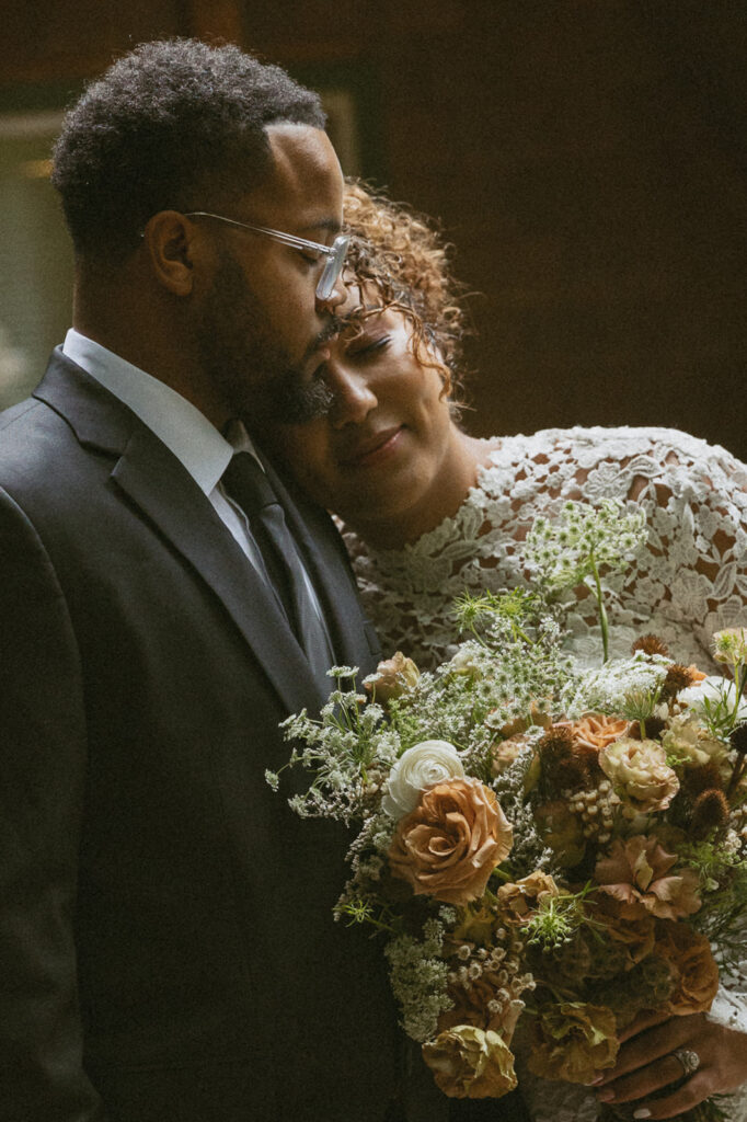 boho bride and groom in the forest