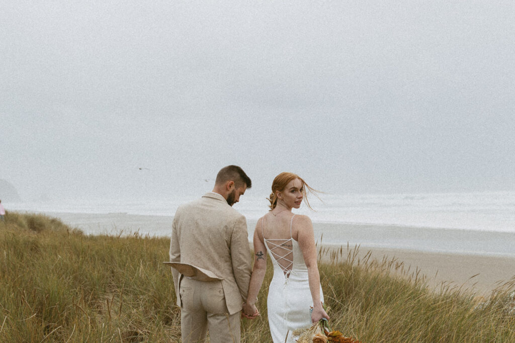 bride and groom at the beach shore