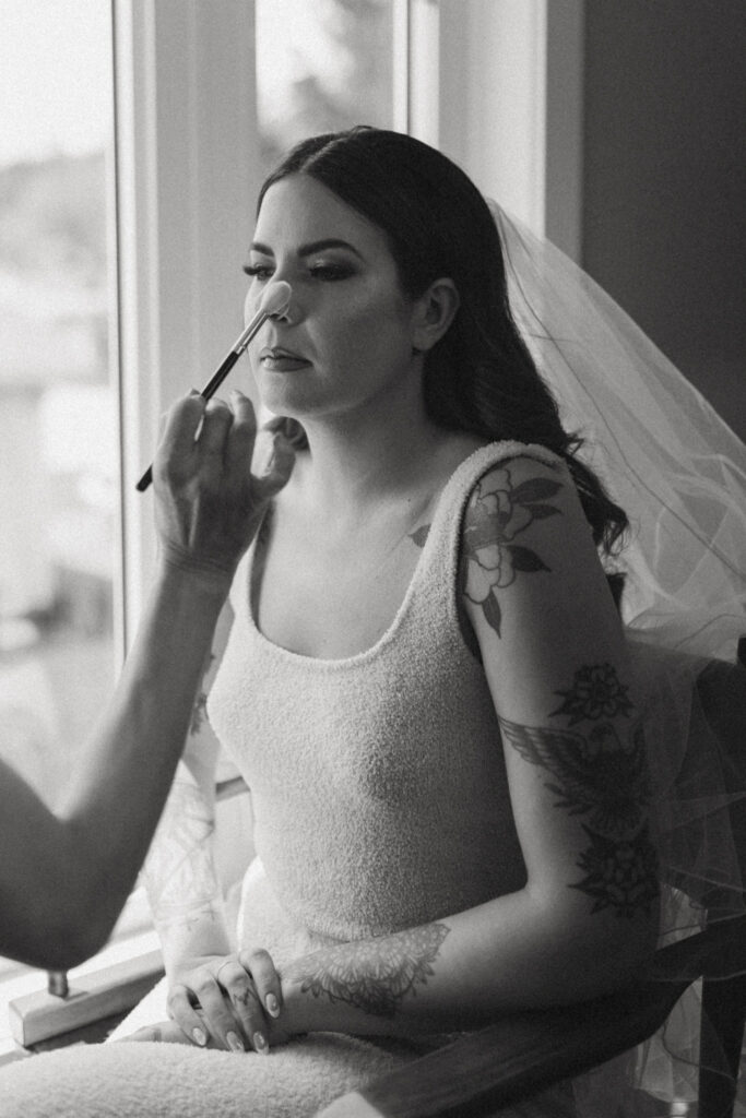 bride getting ready for her wedding in fernie, BC