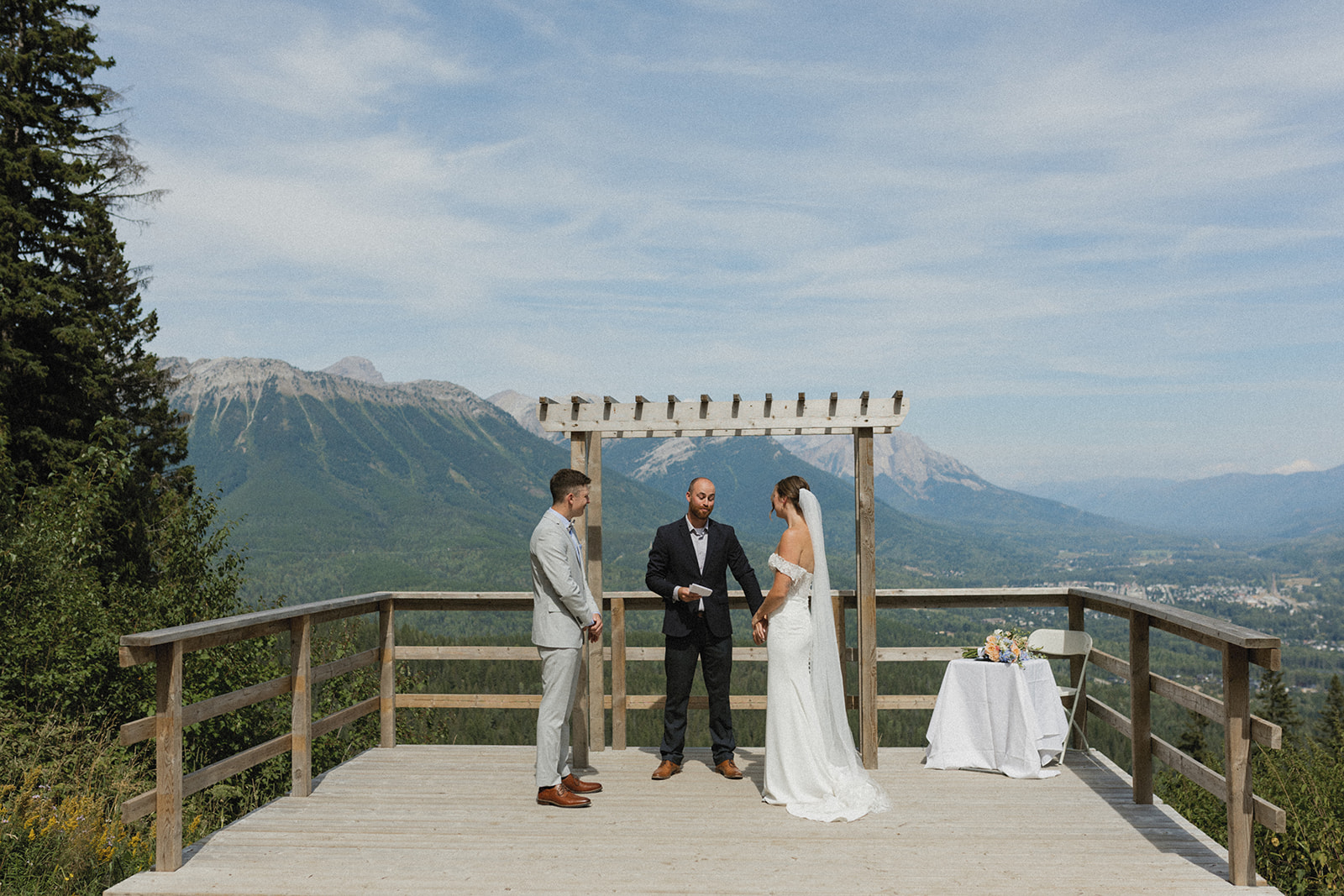 Mountain backdrop for wedding ceremony at Fernie Alpine Resort