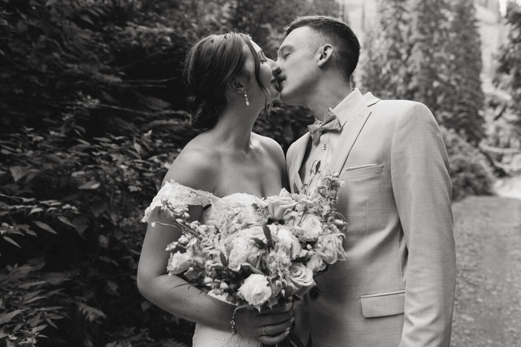 Bride and groom embracing at Fernie Alpine Resort
