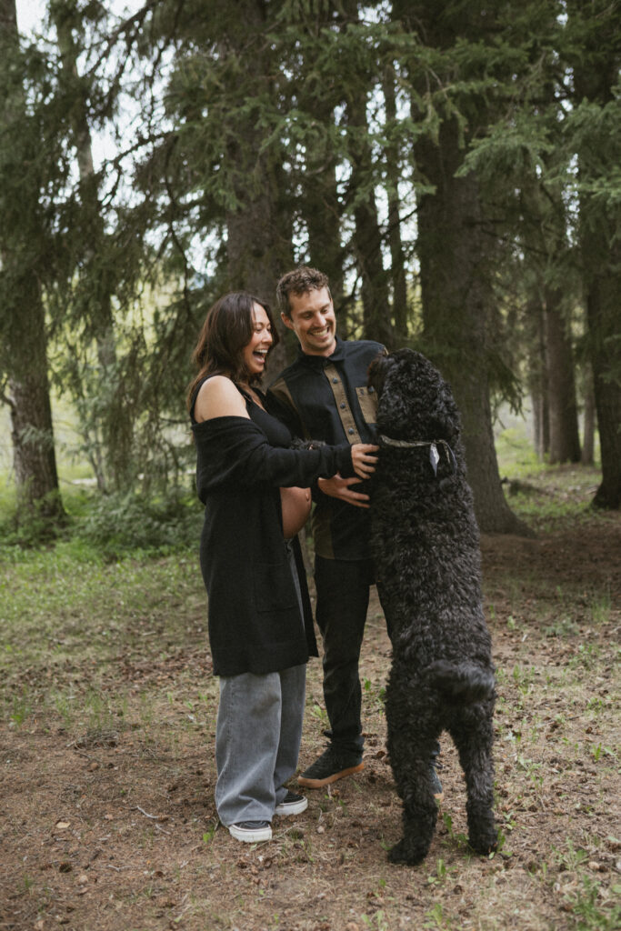 Cinematic shot of Banjo jumping up on the couple, who are mid-embrace in the forest